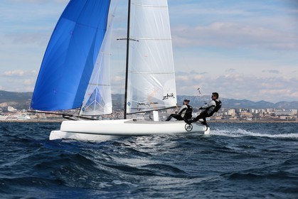 Ingrid Petitjean et Olivier Backes lors du baptême de leur Nacra 17 à la SNM. En route pour les JO de Rio