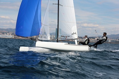 Ingrid Petitjean et Olivier Backes lors du baptême de leur Nacra 17 à la SNM. En route pour les JO de Rio