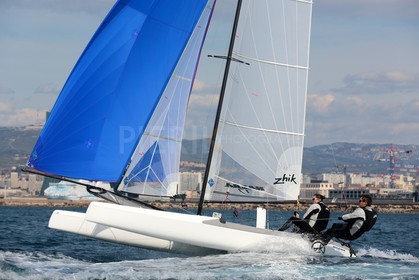 Ingrid Petitjean et Olivier Backes lors du baptême de leur Nacra 17 à la SNM. En route pour les JO de Rio