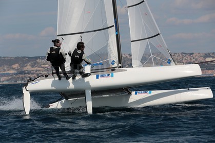 Ingrid Petitjean et Olivier Backes lors du baptême de leur Nacra 17 à la SNM. En route pour les JO de Rio