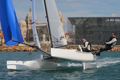 Ingrid Petitjean et Olivier Backes lors du baptême de leur Nacra 17 à la SNM. En route pour les JO de Rio