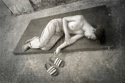 Sieste dans la rue de Ho Chi Minh