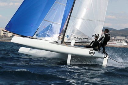 Ingrid Petitjean et Olivier Backes lors du baptême de leur Nacra 17 à la SNM. En route pour les JO de Rio