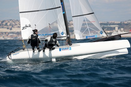 Ingrid Petitjean et Olivier Backes lors du baptême de leur Nacra 17 à la SNM. En route pour les JO de Rio
